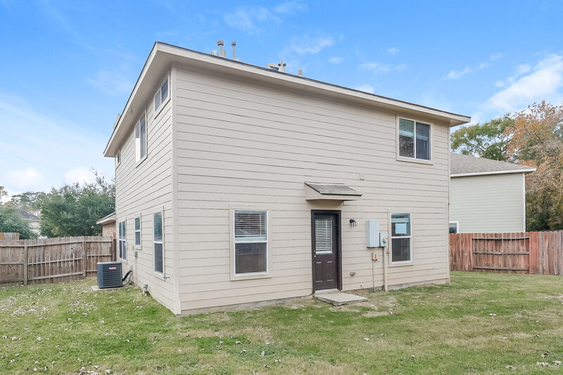 1,580/Mo, 1403 Natural Pine Trl Conroe, TX 77301 Rear View