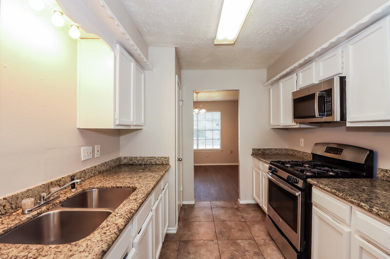 1,815/Mo, 16303 La Gloria Dr Houston, TX 77083 Kitchen View 2