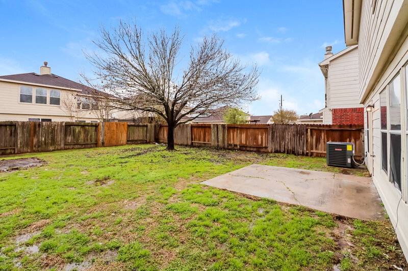 1,945/Mo, 15411 Blue Creek Ranch Dr Houston, TX 77086 Rear View