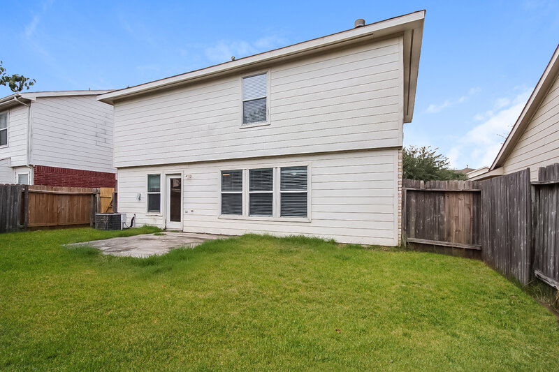 1,945/Mo, 15411 Blue Creek Ranch Dr Houston, TX 77086 Rear View 3