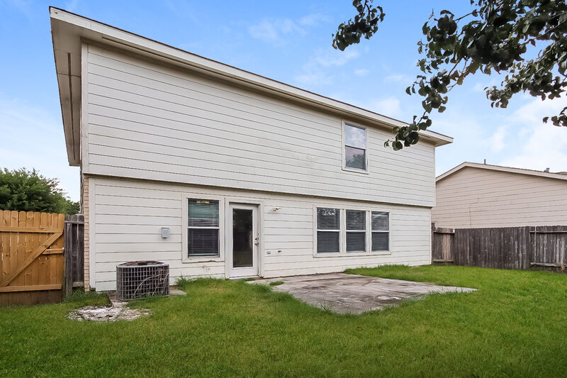 1,945/Mo, 15411 Blue Creek Ranch Dr Houston, TX 77086 Rear View 5