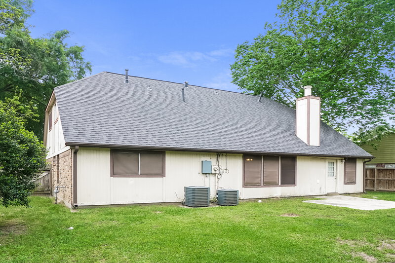0/Mo, 8215 Burnt Ash Dr Humble, TX 77338 Rear View
