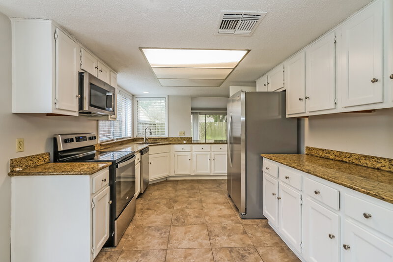 1,945/Mo, 7707 Leafbrook Lane Spring, TX 77379 Kitchen View
