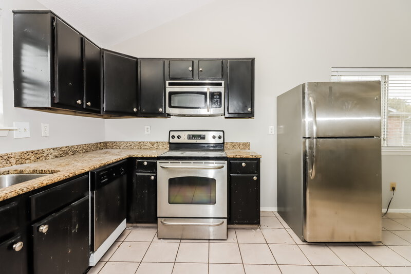 1,480/Mo, 7807 Chaseview Dr Missouri City, TX 77489 Kitchen View 2