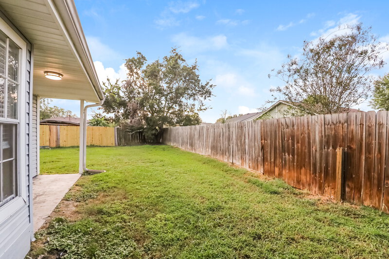 1,650/Mo, 10003 Tahoka Ln Sugar Land, TX 77498 Rear View