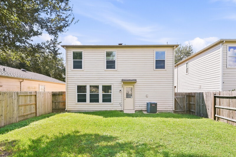 1,750/Mo, 3231 Dartmouth Field Ln Fresno, TX 77545 Rear View
