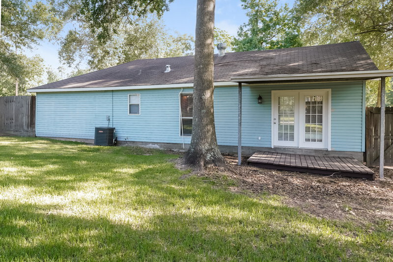 1,915/Mo, 12203 Deer Wood Pinehurst, TX 77362 Rear View