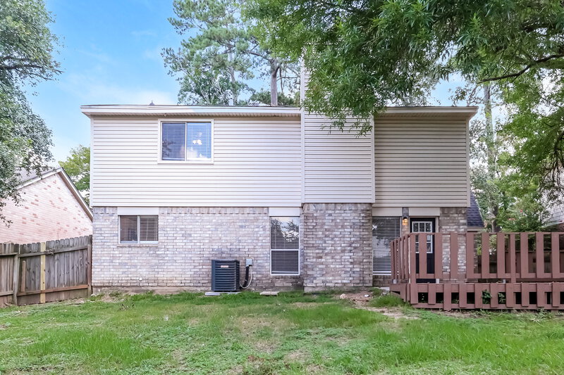 1,900/Mo, 1918 Hunnington Dr Conroe, TX 77303 Rear View