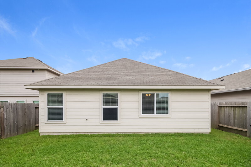 2,000/Mo, 16723 Highland Villa Ln Humble, TX 77396 Rear View