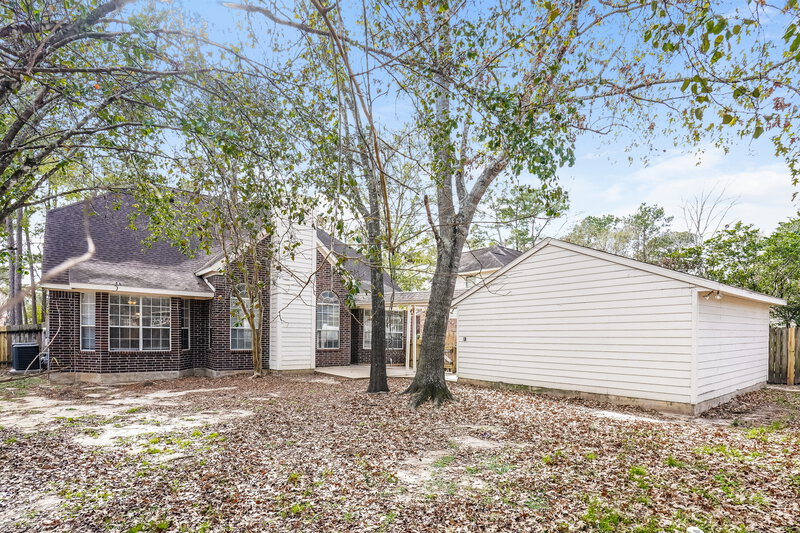 2,235/Mo, 3931 Echo Mountain Dr Kingwood, TX 77345 Rear View