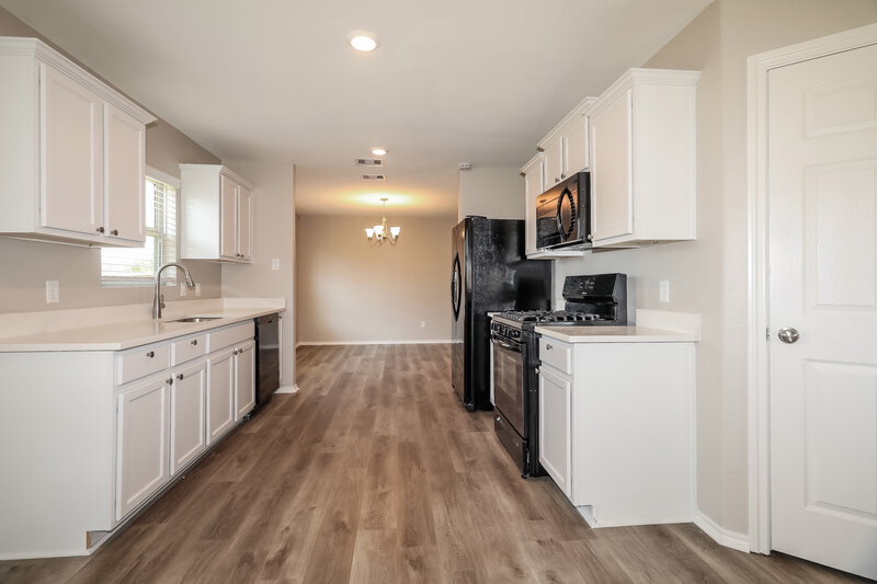 1,995/Mo, 1249 Blue Hazel Ct Pinehurst, TX 77362 Kitchen View