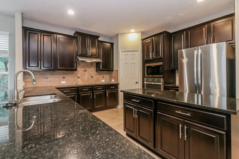 2,525/Mo, 8402 Oak Knot Ct Spring, TX 77389 Kitchen View 2