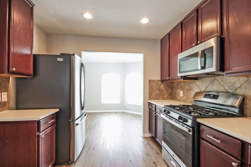 0/Mo, 9943 Chimney Swift Ln Conroe, TX 77385 Kitchen View 2