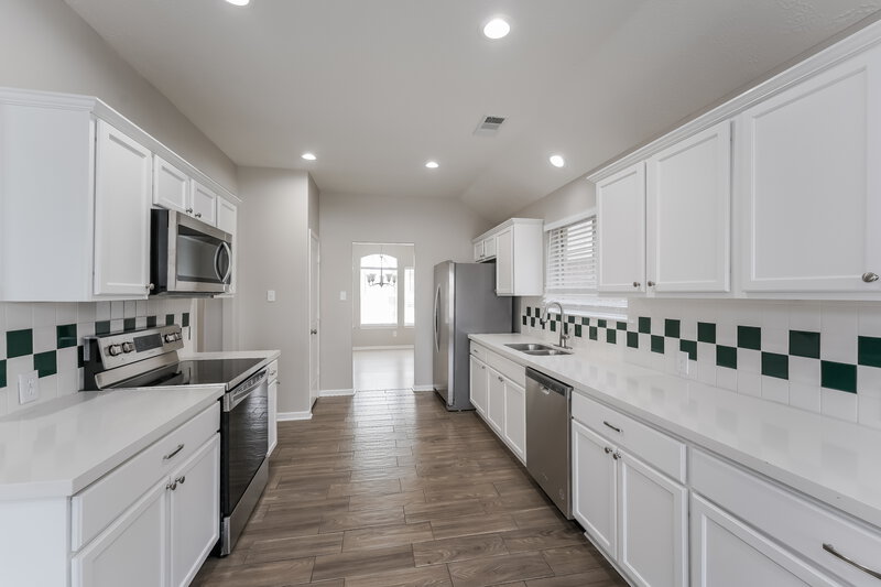 2,085/Mo, 18006 Oakmoss Hill Ct Richmond, TX 77407 Kitchen View 2