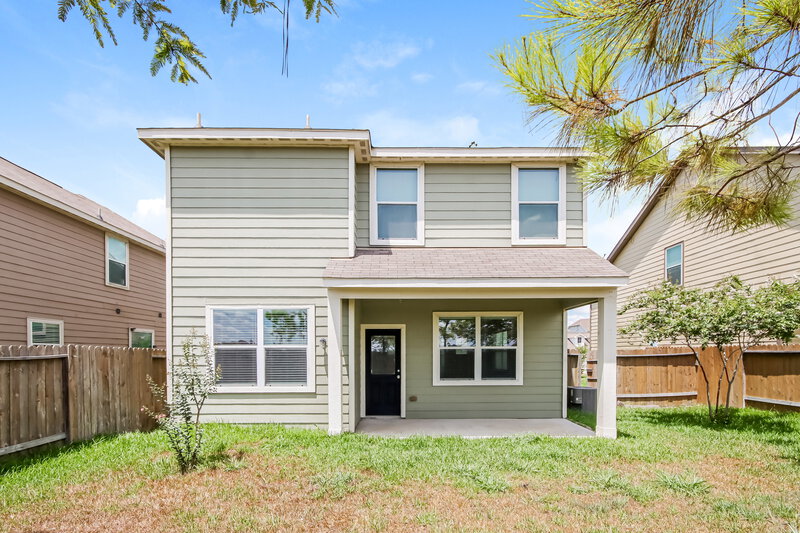 1,900/Mo, 10855 S Lake Mist Ln Willis, TX 77318 Rear View
