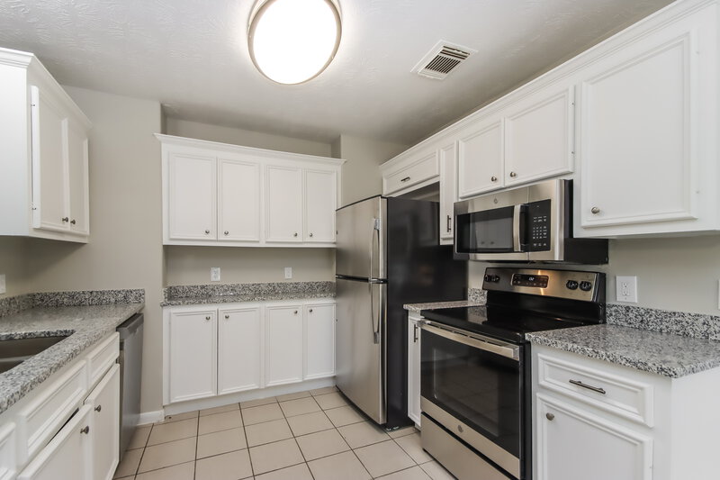 1,415/Mo, 1708 Tyler St Conroe, TX 77301 Kitchen View 2