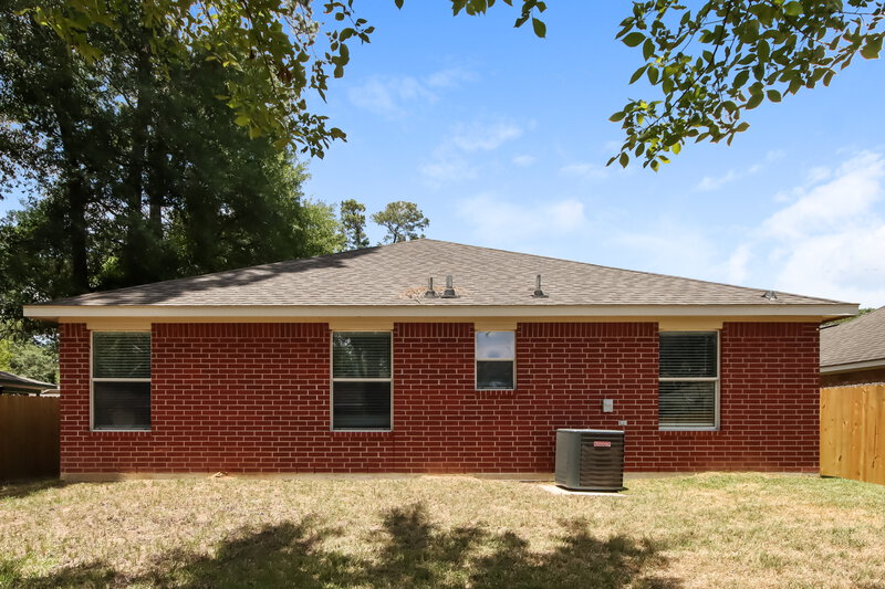 1,415/Mo, 1708 Tyler St Conroe, TX 77301 Rear View