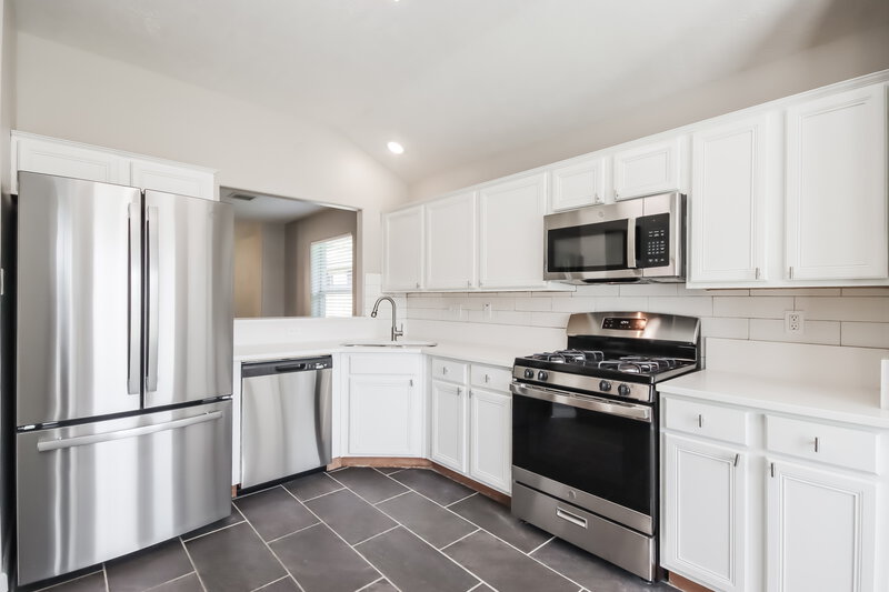 1,805/Mo, 1615 Trail Oaks Ct Humble, TX 77339 Kitchen View 2