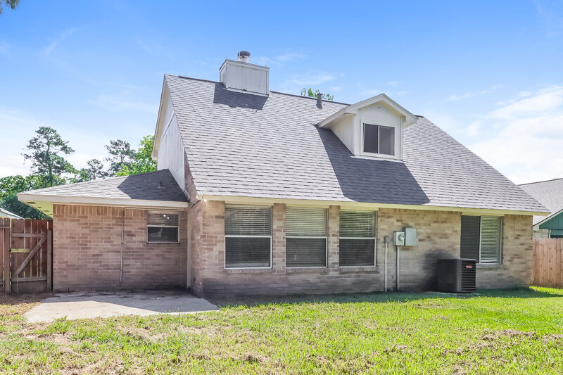 1,790/Mo, 4017 Hunnington Dr # A1 Conroe, TX 77303 Rear View
