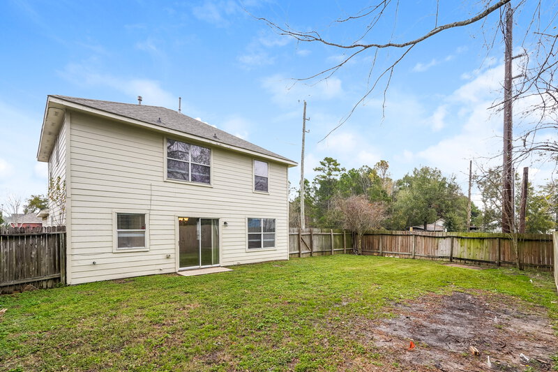 1,910/Mo, 19402 Garden Pool Ln Tomball, TX 77375 Rear View