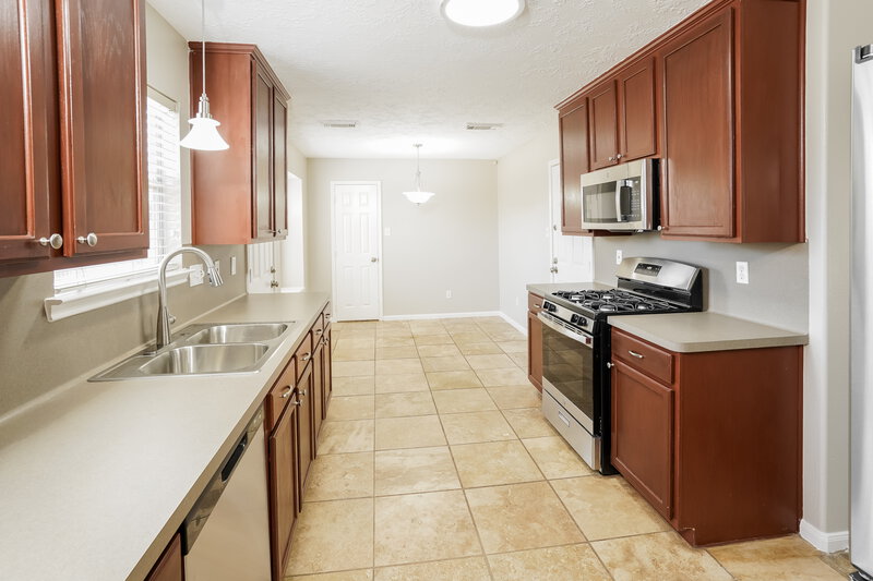 1,770/Mo, 32034 Ashton Ln Pinehurst, TX 77362 Kitchen View