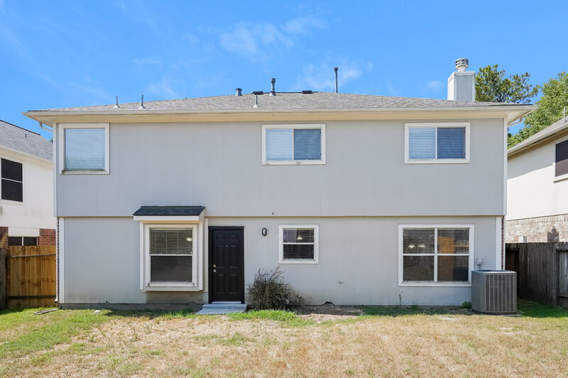 1,770/Mo, 32034 Ashton Ln Pinehurst, TX 77362 Rear View