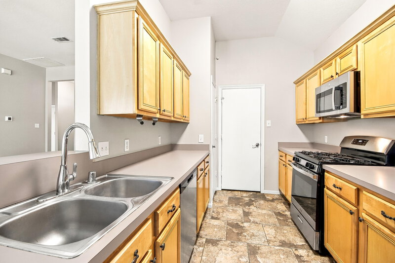 1,790/Mo, 11927 Belle Ct Pinehurst, TX 77362 Kitchen View 2