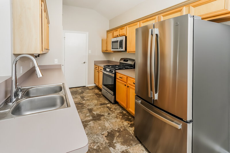 1,880/Mo, 11927 Belle Ct Pinehurst, TX 77362 Kitchen View