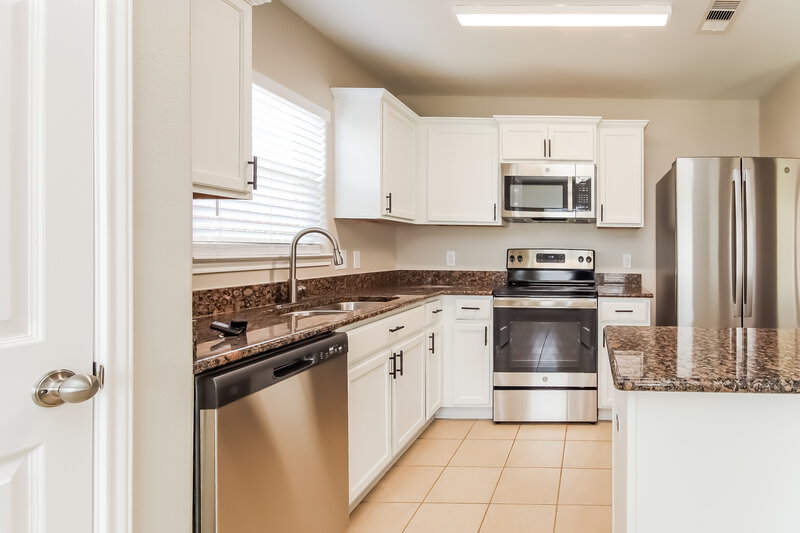 1,875/Mo, 12127 Clara Ln Pinehurst, TX 77362 Kitchen View 2