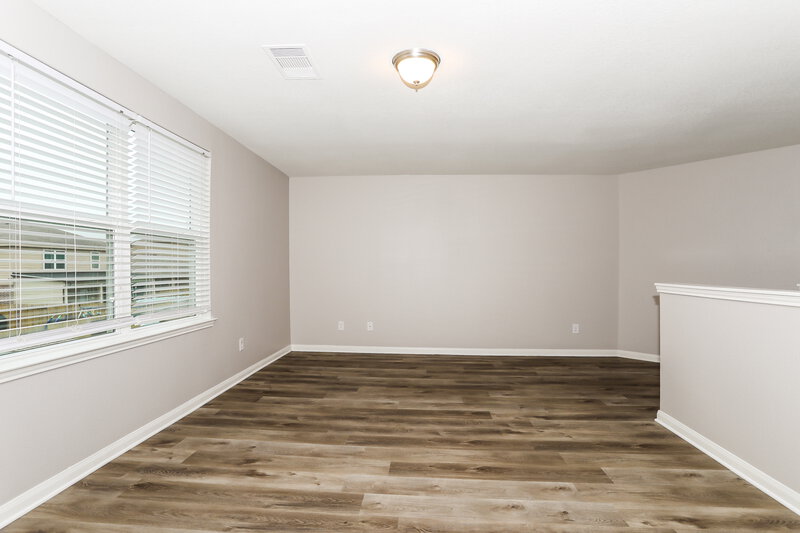 2,510/Mo, 12027 Fairquarter Ln Pinehurst, TX 77362 Family Room View