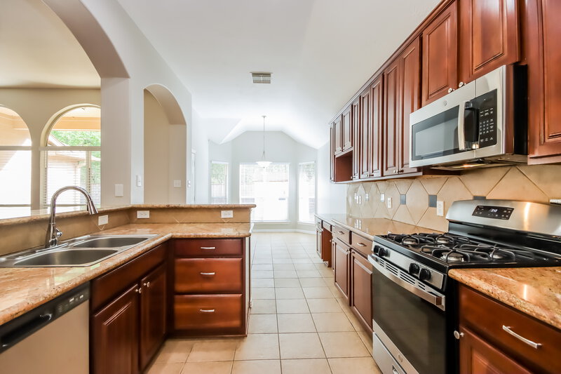 1,930/Mo, 14102 Seagler Springs Ln Houston, TX 77044 Kitchen View 2