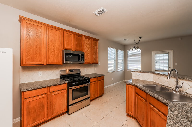 2,235/Mo, 7423 Oakwood Canyon Dr Cypress, TX 77433 Kitchen View 2