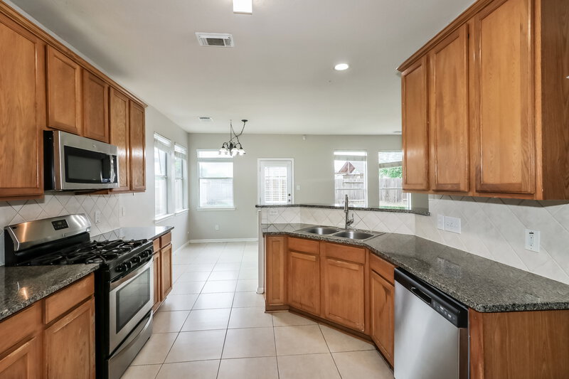 2,275/Mo, 7423 Oakwood Canyon Dr Cypress, TX 77433 Kitchen View 2