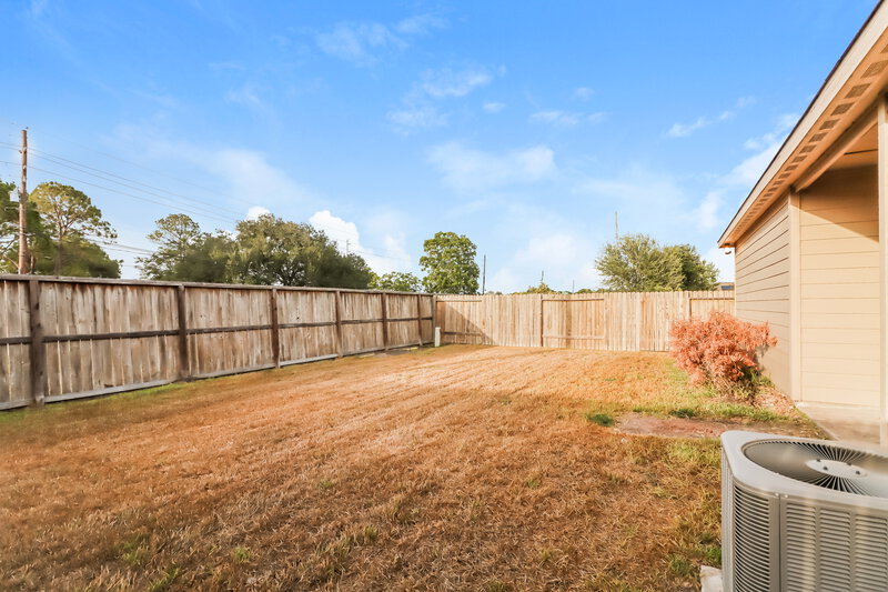 2,145/Mo, 2327 Golden Brandy Ln Rosenberg, TX 77469 Backyard View