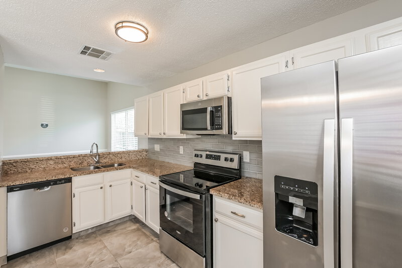 1,935/Mo, 8615 Pine Falls Dr Houston, TX 77095 Kitchen View