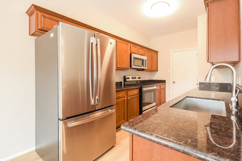 2,175/Mo, 32103 Sue Ln Pinehurst, TX 77362 Kitchen View 2
