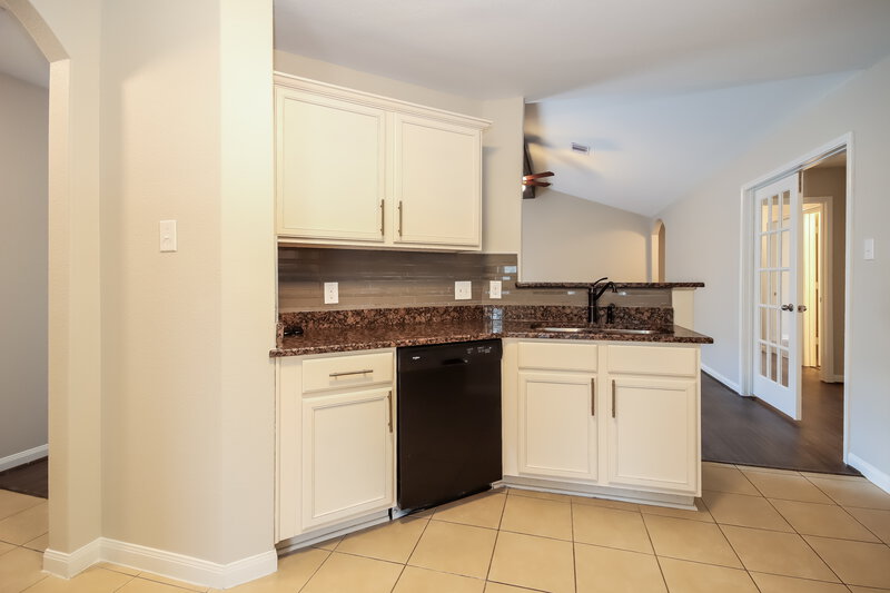 2,085/Mo, 12039 Fairquarter Ln Pinehurst, TX 77362 Kitchen View 2