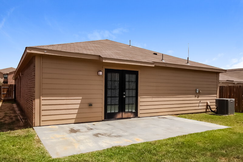 2,085/Mo, 12039 Fairquarter Ln Pinehurst, TX 77362 Rear View
