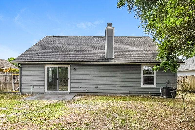 1,750/Mo, 8785 Spring Harvest Ln E Jacksonville, FL 32244 Rear View