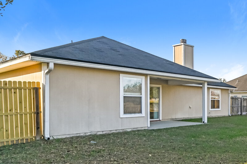 3,000/Mo, 7057 Rapid River Dr W Jacksonville, FL 32219 Rear View