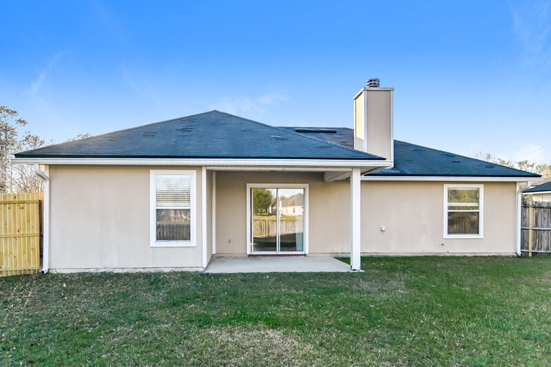 3,000/Mo, 7057 Rapid River Dr W Jacksonville, FL 32219 Rear View 2