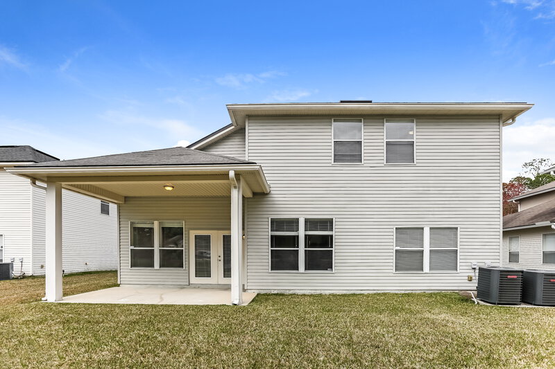 2,265/Mo, 3948 Anderson Woods Dr Jacksonville, FL 32218 Rear View