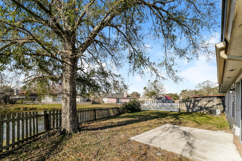 1,850/Mo, 7788 Macdougall Dr Jacksonville, FL 32244 Rear View