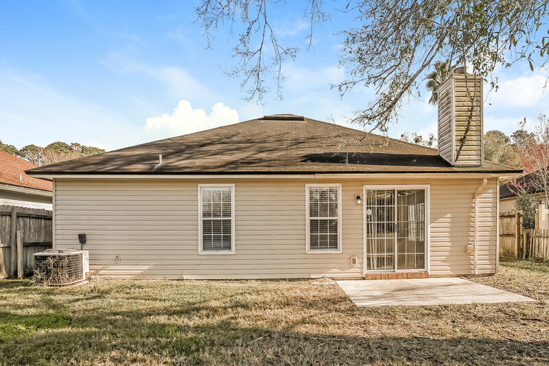 1,850/Mo, 7788 Macdougall Dr Jacksonville, FL 32244 Rear View 2