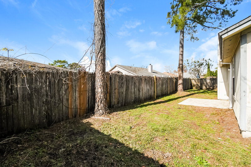 1,700/Mo, 7748 Collins Ridge Blvd Jacksonville, FL 32244 Rear View 2