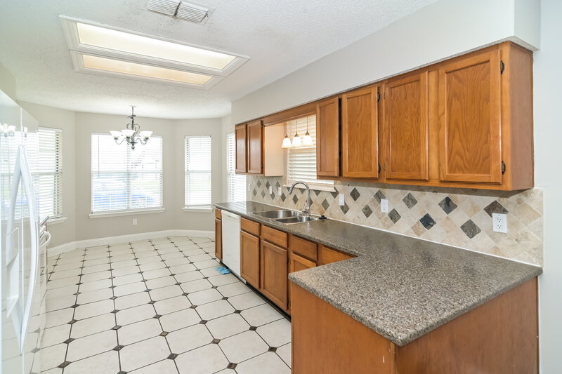 2,390/Mo, 8010 Swamp Flower Dr Jacksonville, FL 32244 Kitchen View