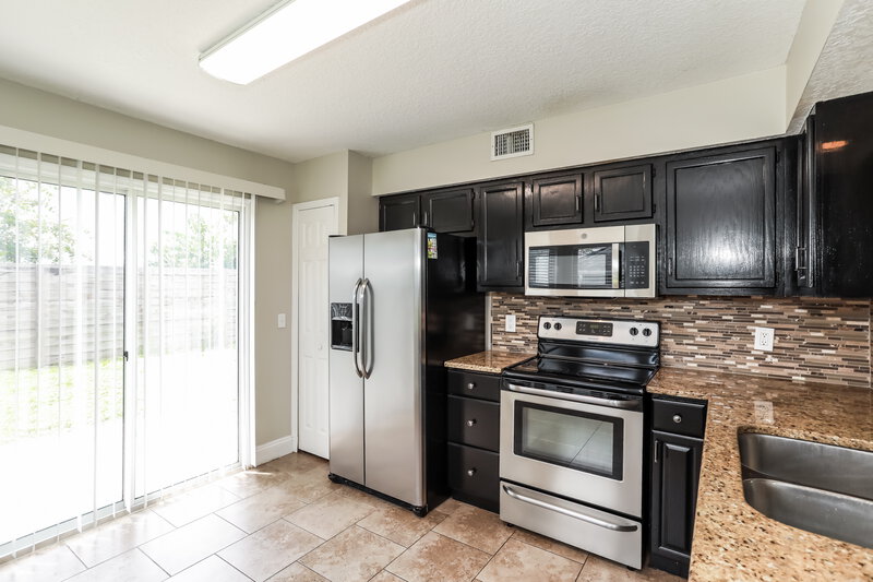 1,975/Mo, 7730 Allspice Cir W Jacksonville, FL 32244 Kitchen View 2