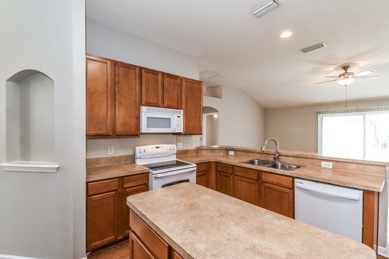 1,930/Mo, 11794 Rolling River Blvd Jacksonville, FL 32219 Kitchen View