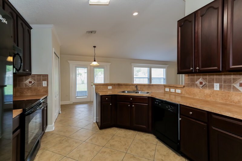2,315/Mo, 2732 Woodsdale Dr Middleburg, FL 32068 Kitchen View