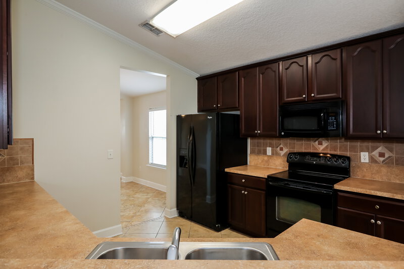 2,315/Mo, 2732 Woodsdale Dr Middleburg, FL 32068 Kitchen View 2